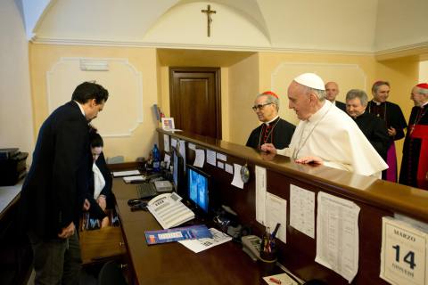 Pope Francis pays his hotel bill on the first day of his pontificate